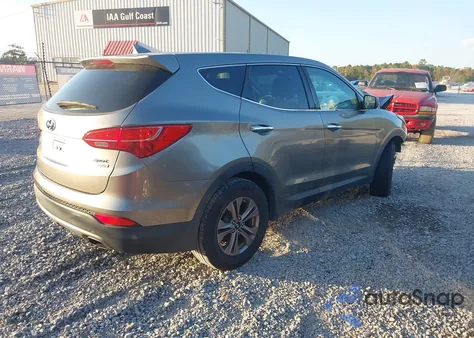 2015 Hyundai Santa Fe Sport 2.4L z USA, uszkodzony, nr VIN 5XYZTDLB4FG266918